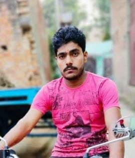 Young man found hanging from a tree in a field