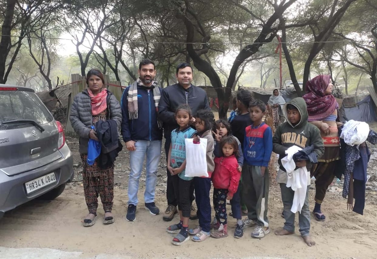 Warm clothes were distributed to the needy in the slum.