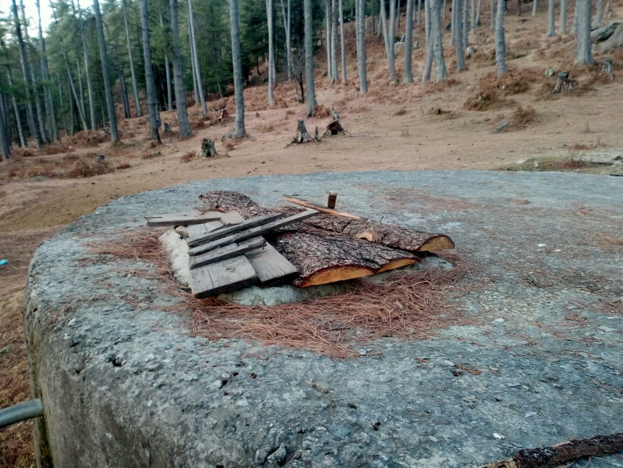 The makeshift lid, peeling paint and grass growing near the tanks are ringing alarm bells.