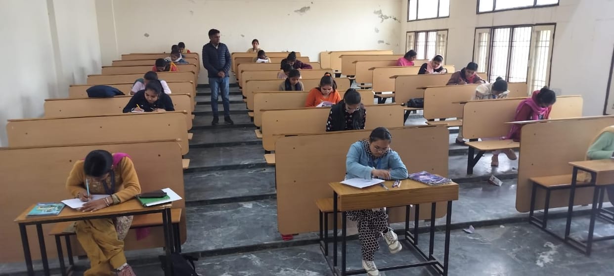 Simran stood first and Ekta stood second in poetry writing