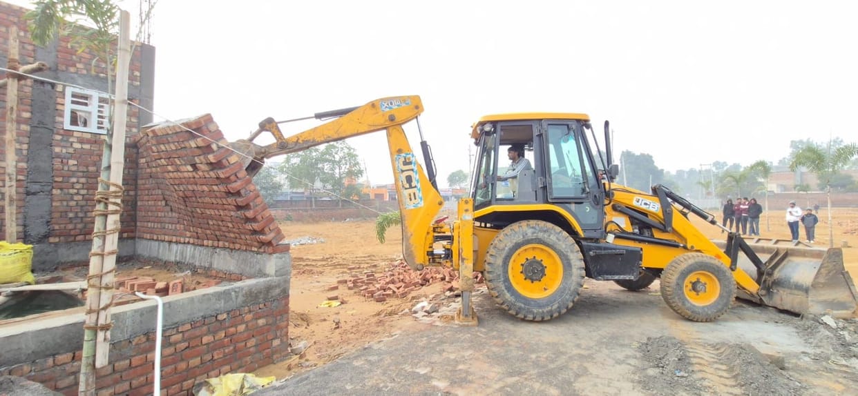 Action taken against two illegal colonies, plots were being sold by erecting roads, sewer lines and electricity poles.
