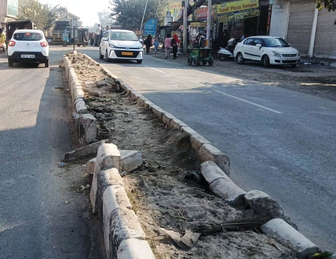 Rohtak Road is in a dilapidated condition, with potholes everywhere causing problems for commuters... posing a risk of accidents.