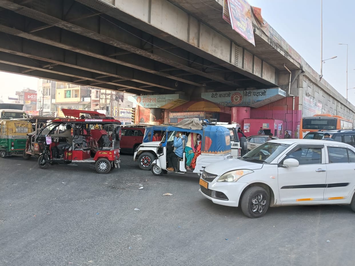The traffic jam caused by the trucks inconvenienced people.
