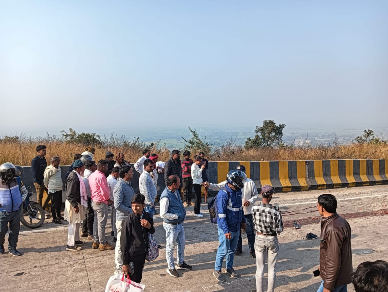 A textile businessman from Prayagraj died after being crushed by a truck that dragged his bike for half a kilometer.