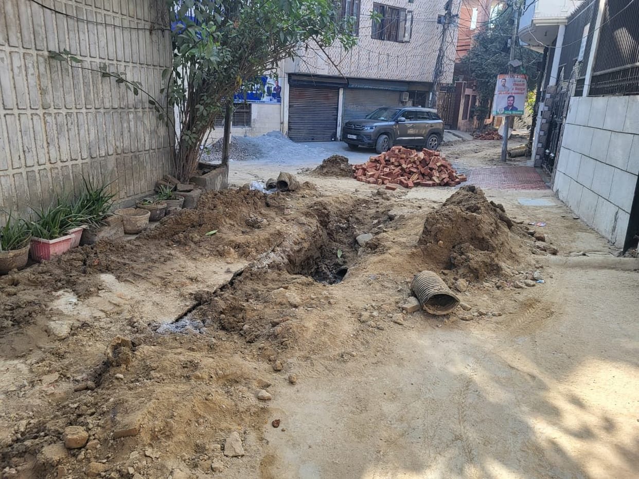 People protested against the demolition of the road in Batra Colony.