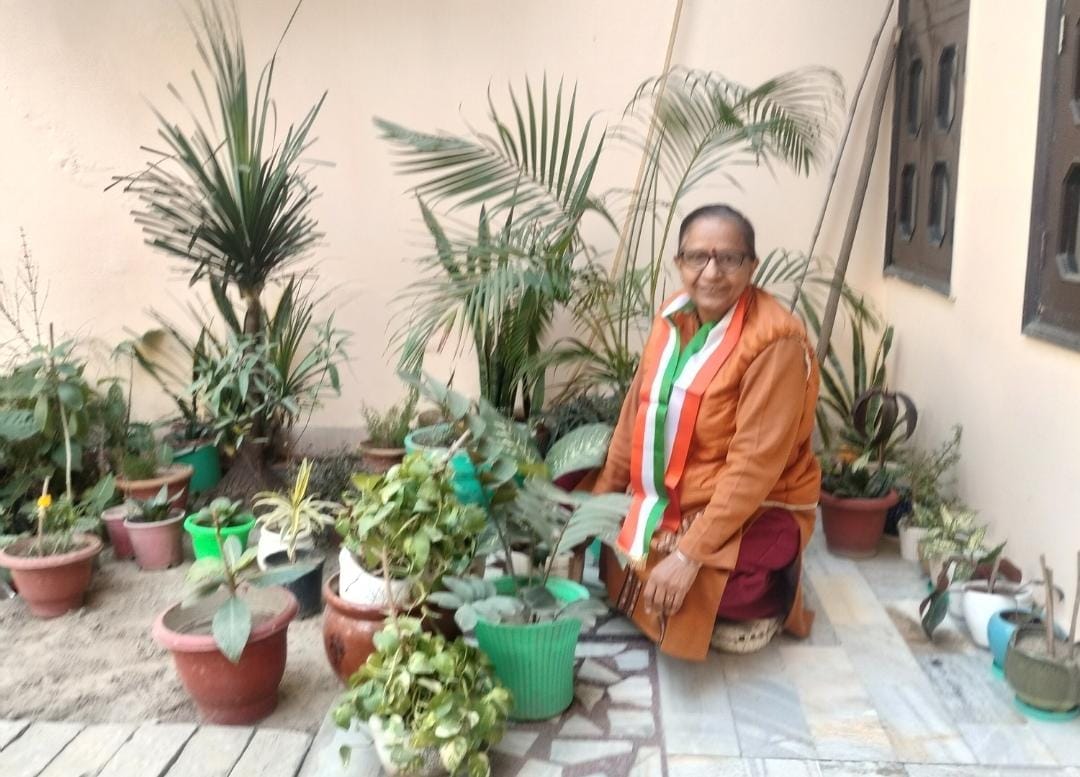 The roof and courtyard are adorned with greenery, the garden filled with fragrance