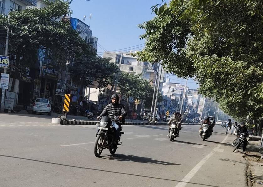 Helmet in hand, rules in pocket; drivers fearlessly ply the road