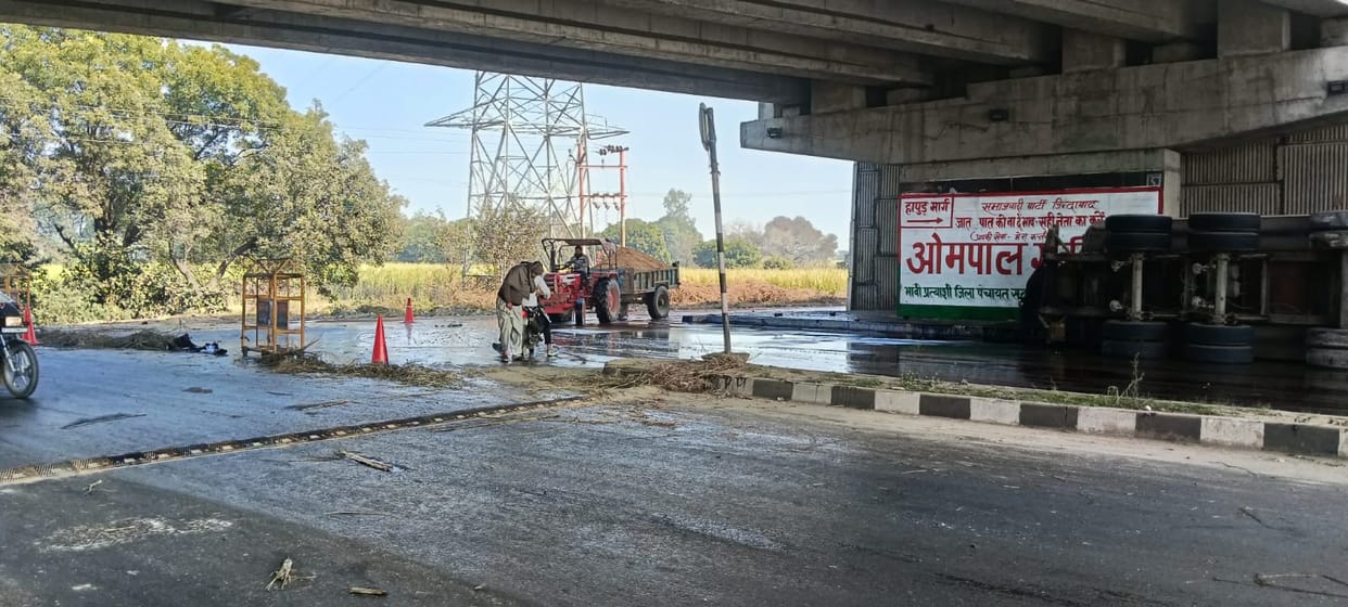 Tanker filled with molasses overturns, two-wheeler rider falls