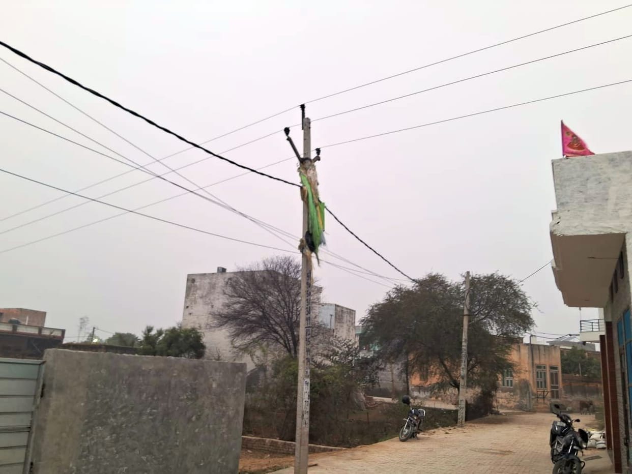 Residents are demanding the removal of the power lines passing through Bhagat Singh Colony.