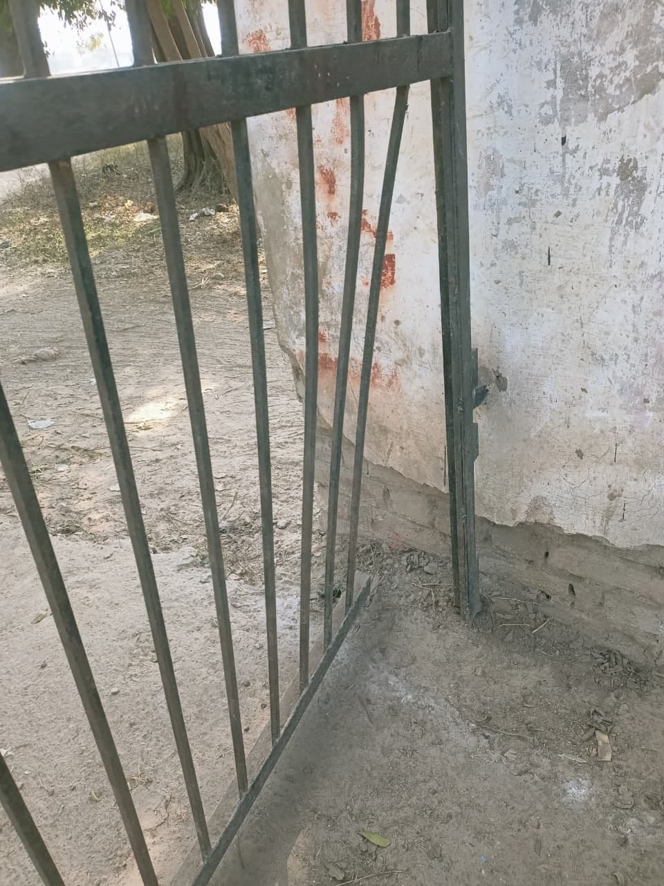 Miscreants damaged the gate of the government school.