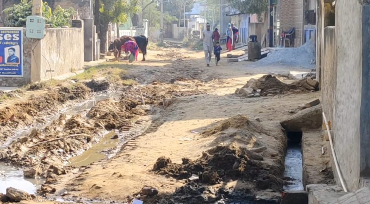 The unpaved road in Dholera village has become a major problem for the residents.