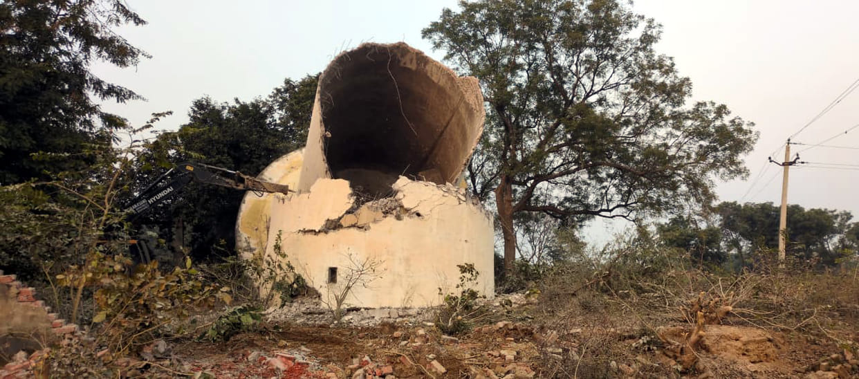 The water tank of Heritage Village Holipura was demolished without making any arrangements for water.