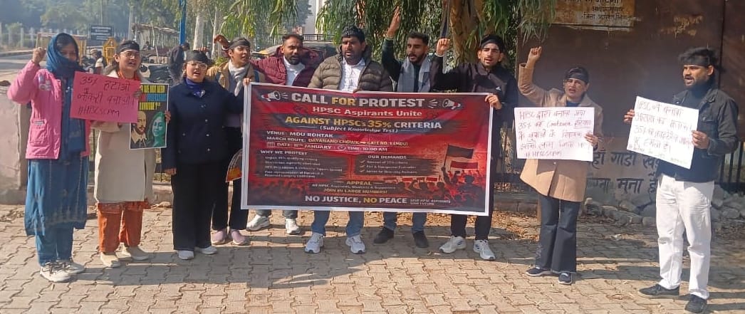 Demand for re-examination of answer sheets, protest by wearing black bands