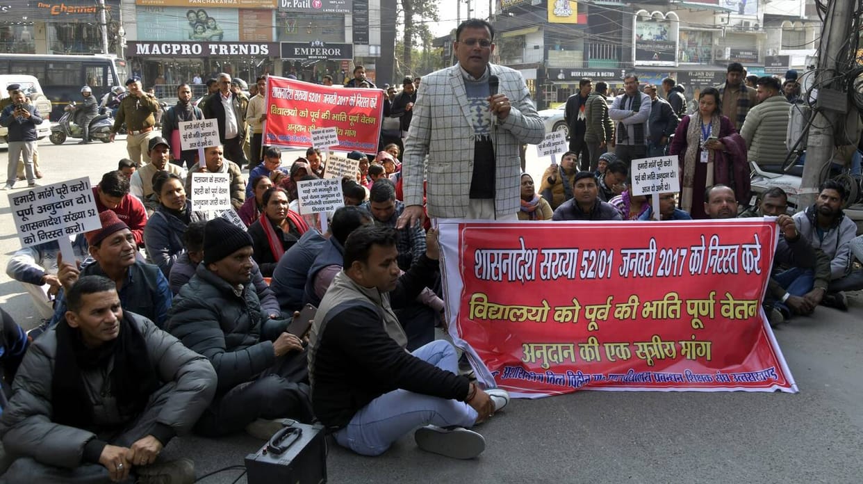 Teachers march to CM's residence for grant