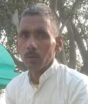 A laborer was killed by hitting him on the head with an axe.
