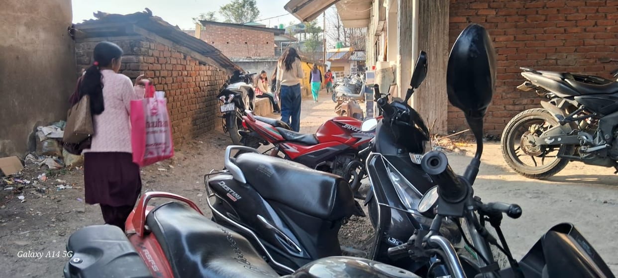Encroachment by vehicles has shrunk the roads, causing inconvenience to pedestrians.