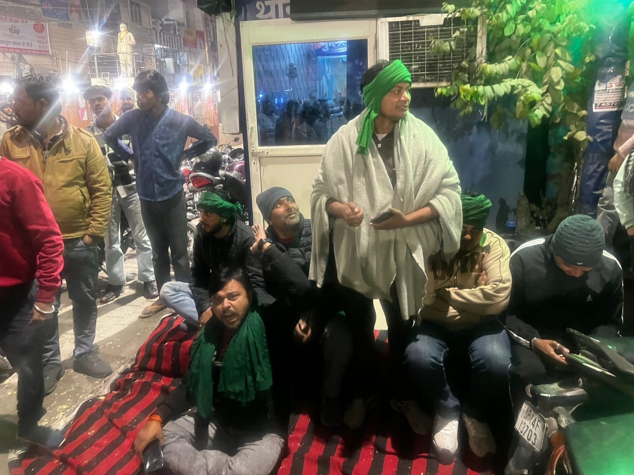 Farmers staged a sit-in in front of the police station, accusing the inspector of demanding a bribe of five thousand rupees.
