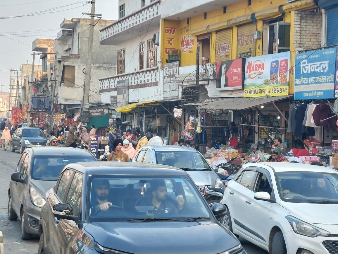 Encroachment and haphazard parking caused traffic jams in the main market of Nising.