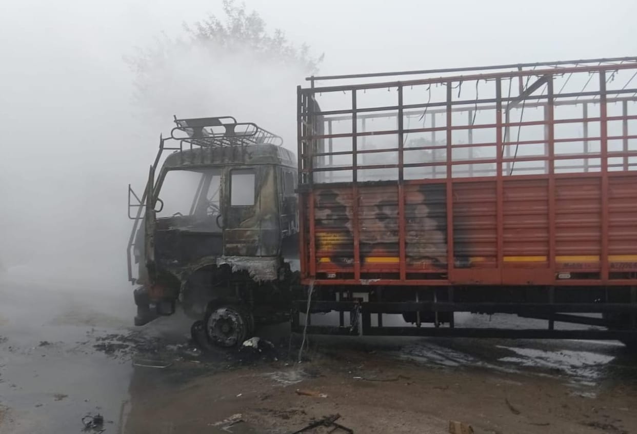 Canter caught fire due to short circuit, driver saved his life by jumping