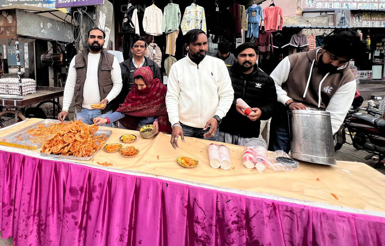 Food distribution was organised in Kalayat on Makar Sankranti