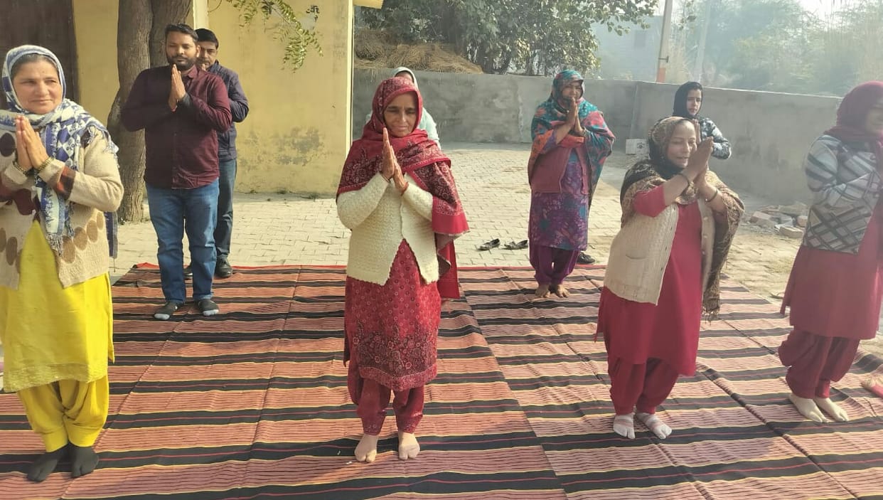 AYUSH department employees and villagers performed Surya Namaskar.