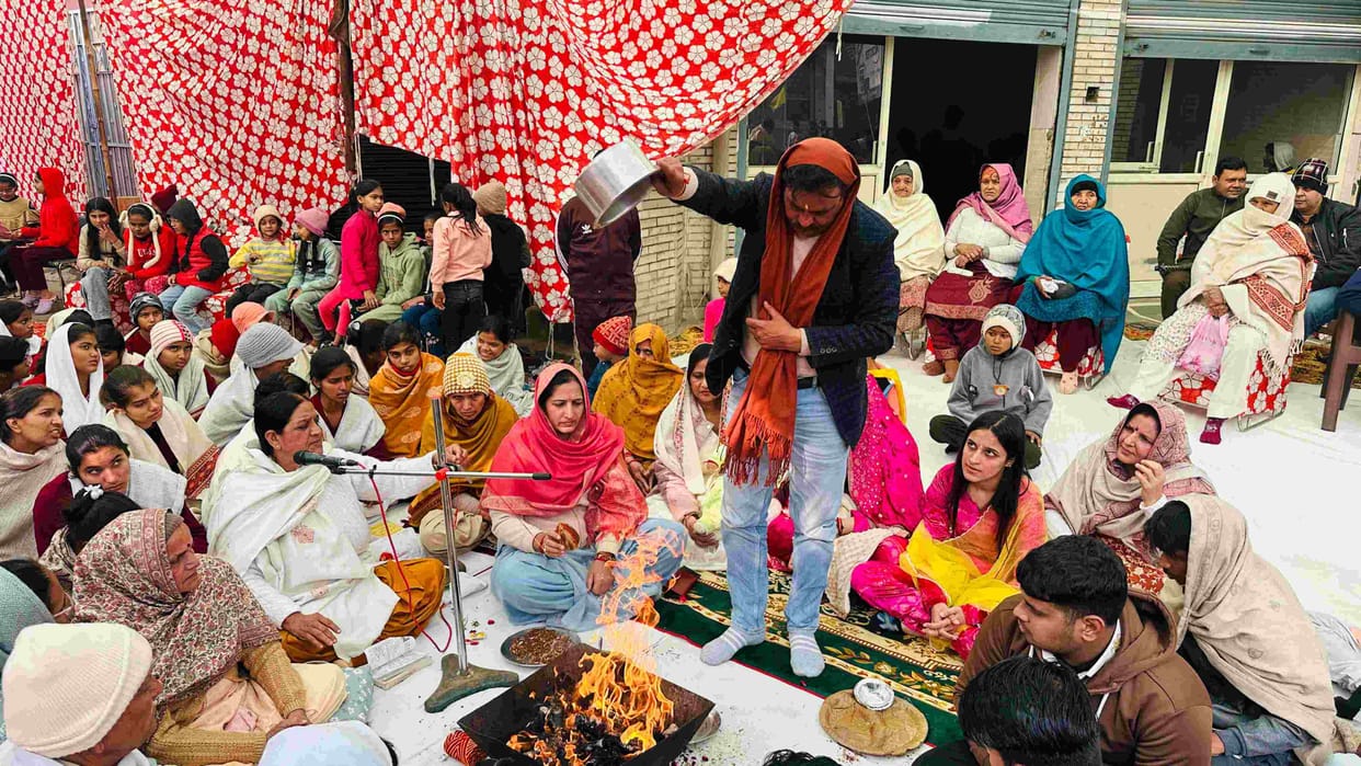 Devotees received prasad at the community meal organized at the Chaughan Mata Temple.