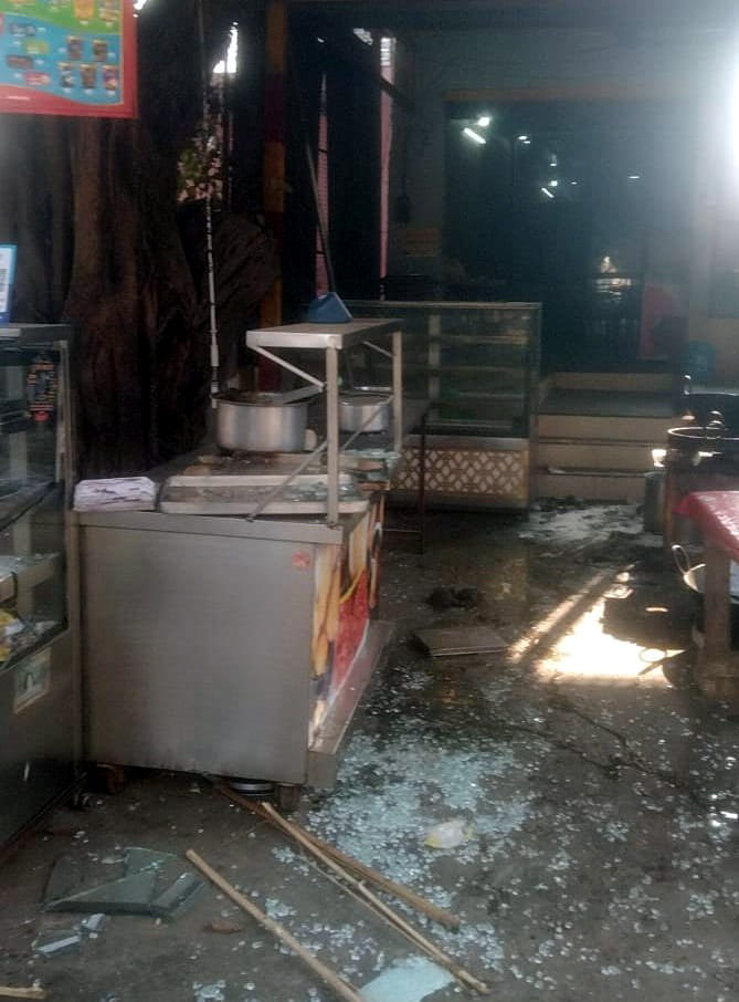 Two sides clashed over possession of a shop, leading to vandalism and firing.