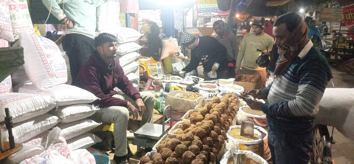 Today, the special offering of 'khichdi' will be prepared as part of the religious ceremony, and the market is bustling with crowds.