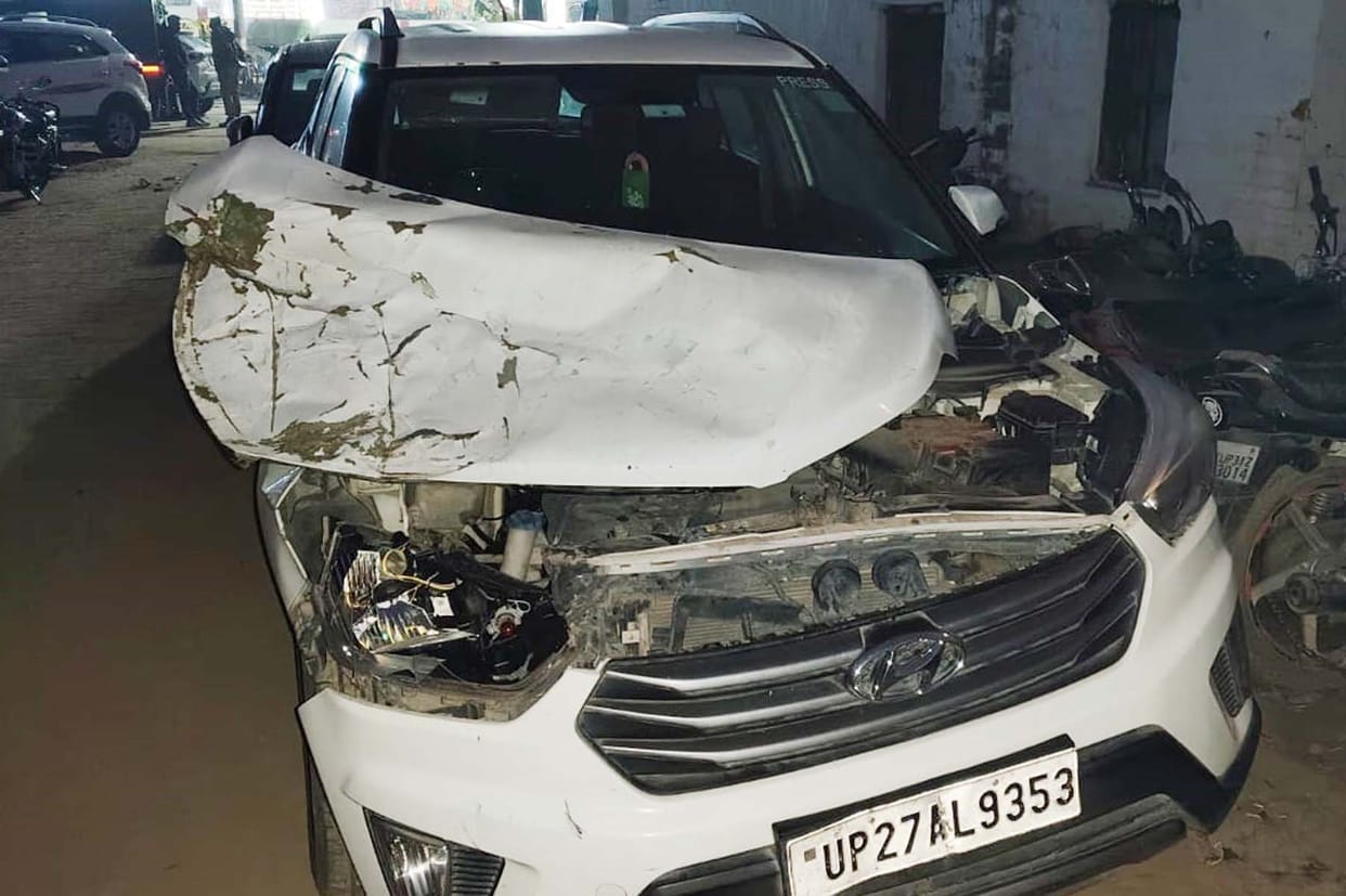 The village head's car collided with a tractor-trolley; police are accused of failing to take action.