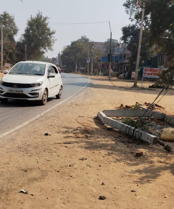 Two electric poles were broken after a truck and a car collided.