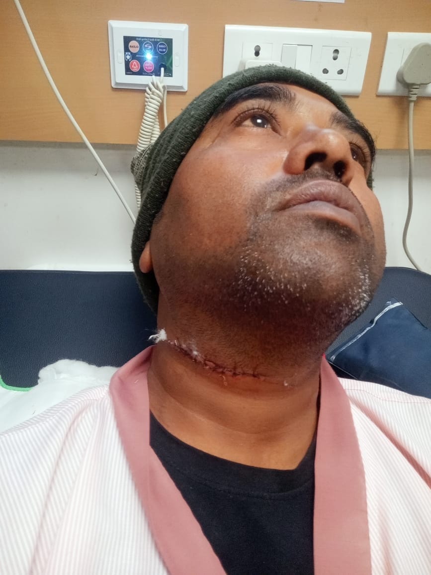 Throat slit with Chinese thread, nine stitches required