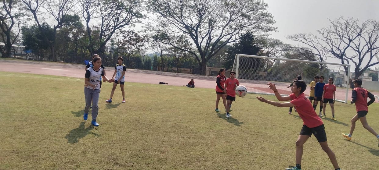 Rugby players practice at the Kalinga Stadium in Bhubaneswar.