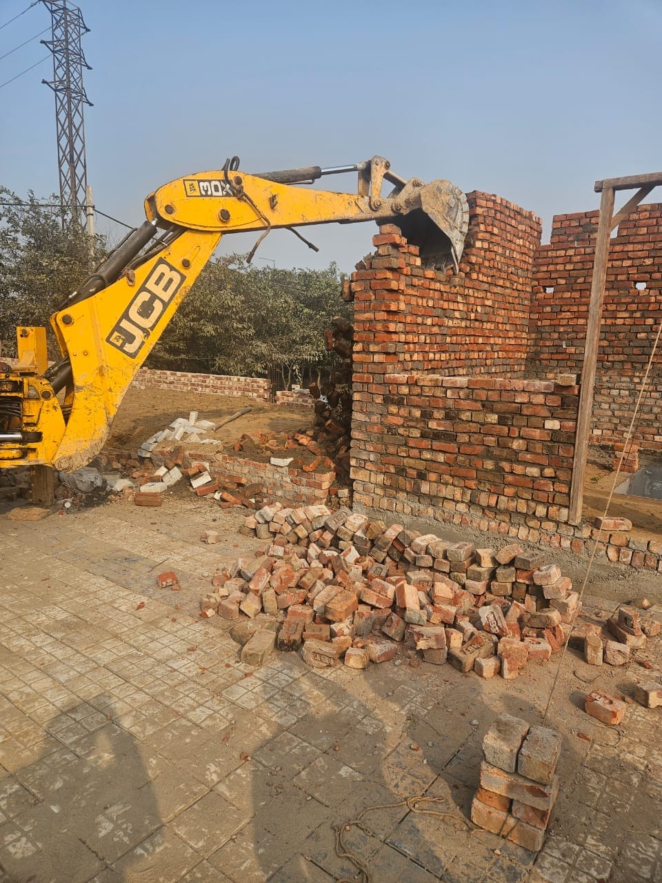 JCBs used on two illegal colonies, demolishing 5.5 acres of construction