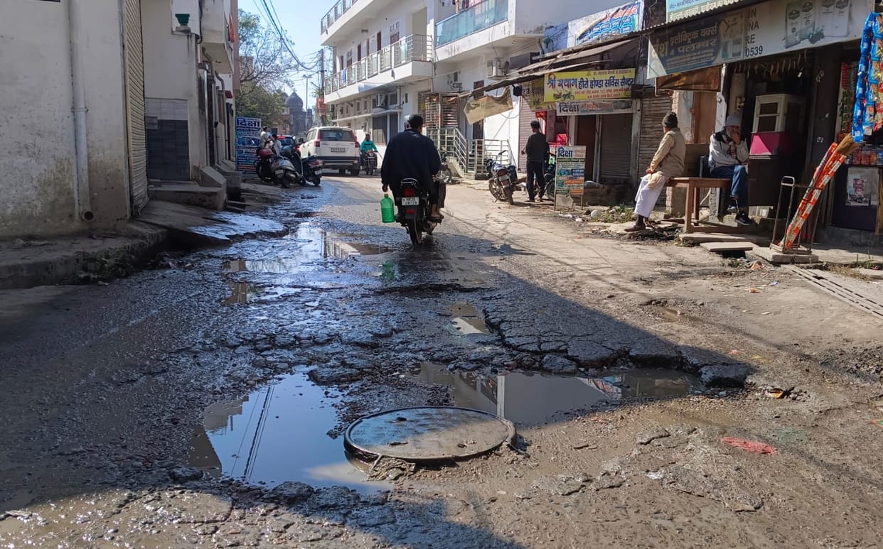 They demanded that the potholes in the road be repaired.