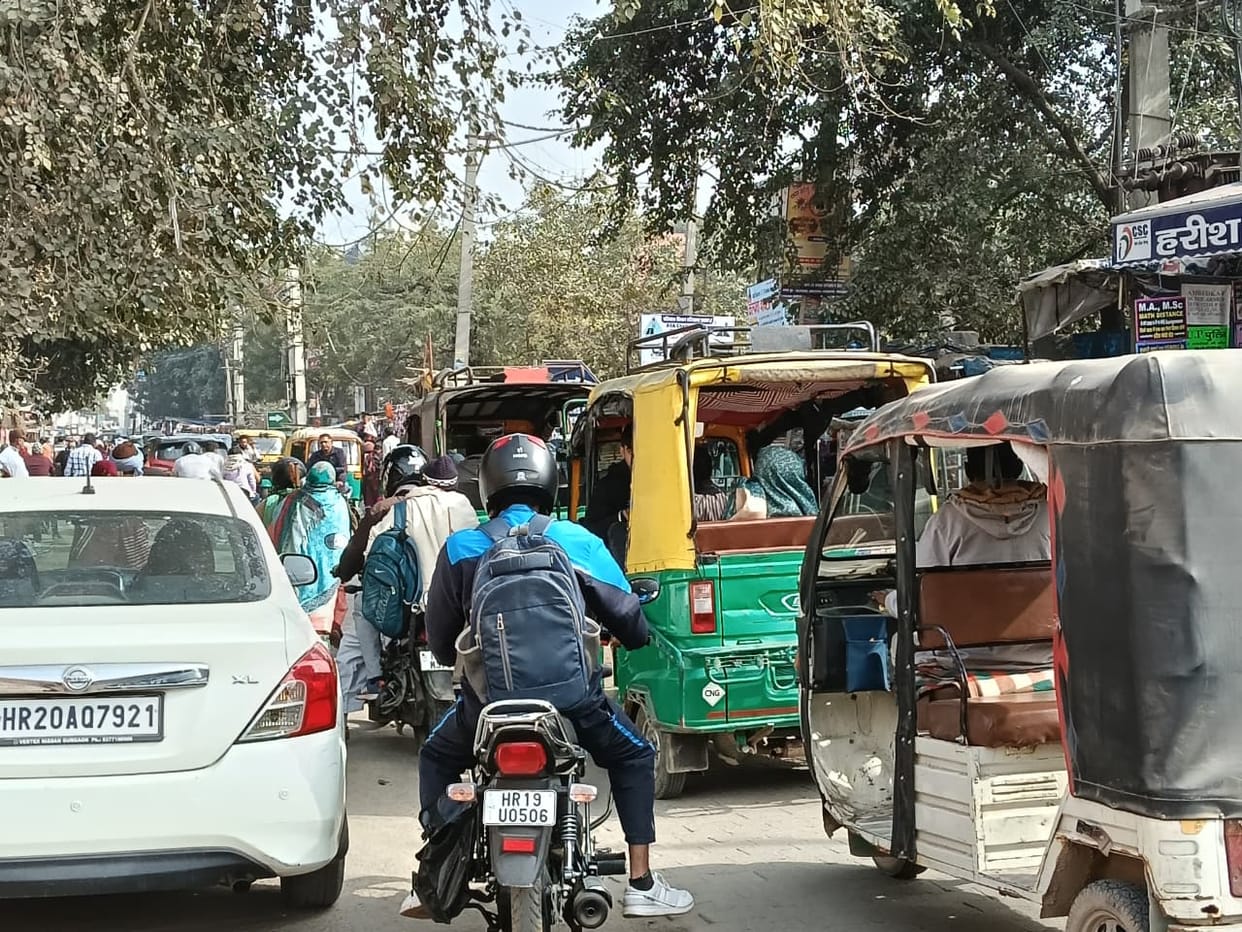 Haphazard parking causes congestion in city markets, increasing problems for pedestrians and drivers