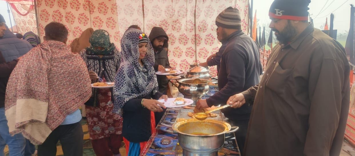 A community feast was organized at the Shani Dev temple in Brahmanwas village.