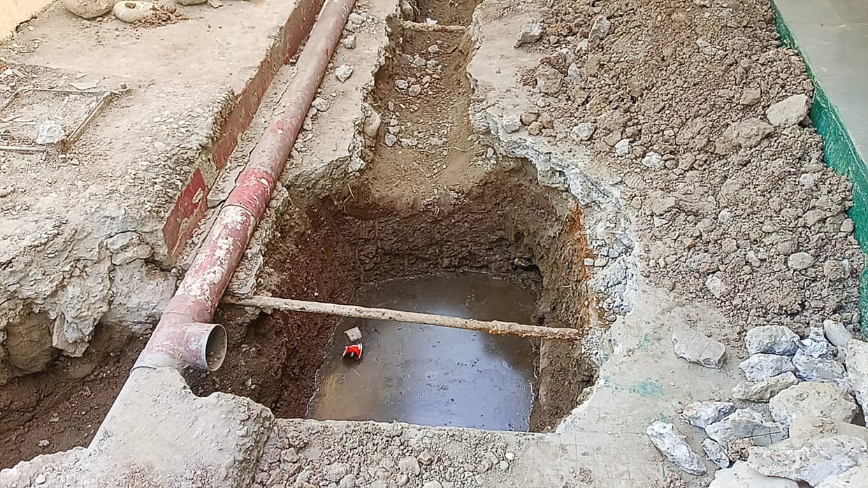 The line dug for repairing the toilet is inviting accidents.