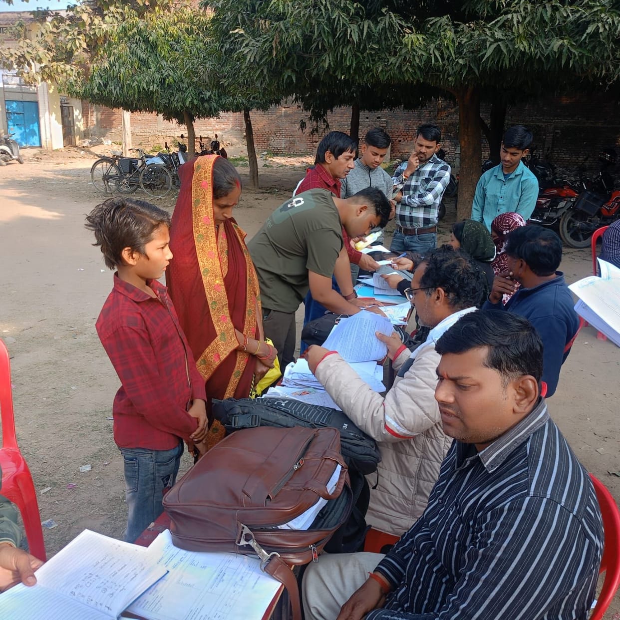 People are running to get errors in names, photos and addresses in the voter list corrected.