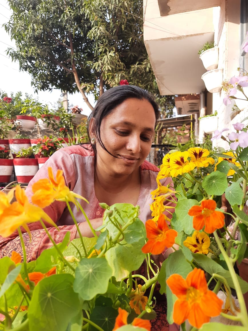 Asha presents books made from 55 varieties of plants from her garden.