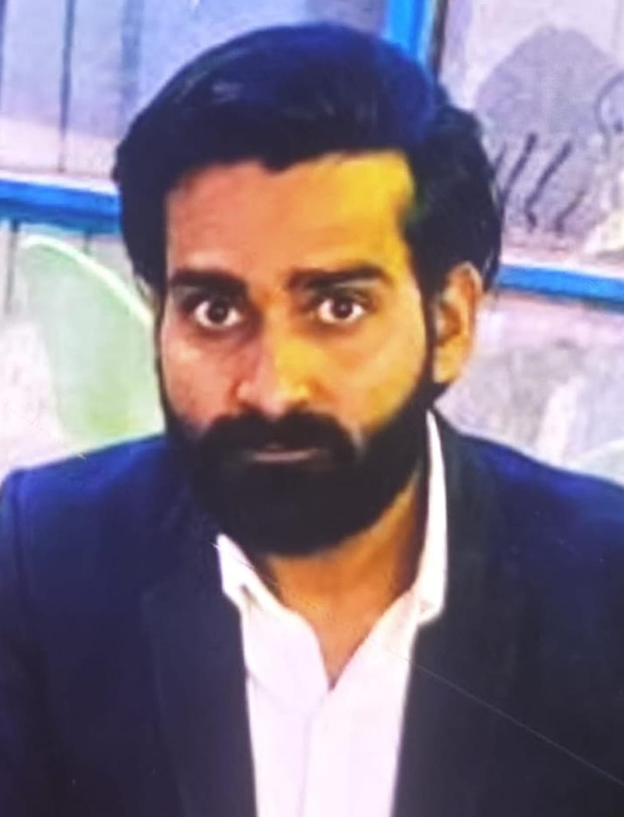 Faizan, who was smoking a cigarette after being injected with drugs, had his throat slit.