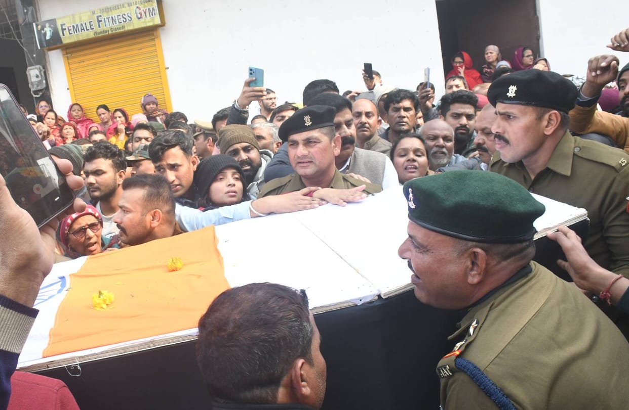 Seeing her son wrapped in the tricolor, tears welled up; the mother said, "Son, get up once."