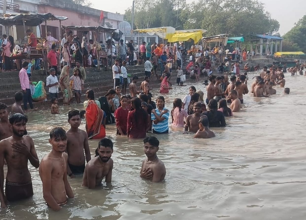 Devotees flock to the ghats to take a bath in the Ganga