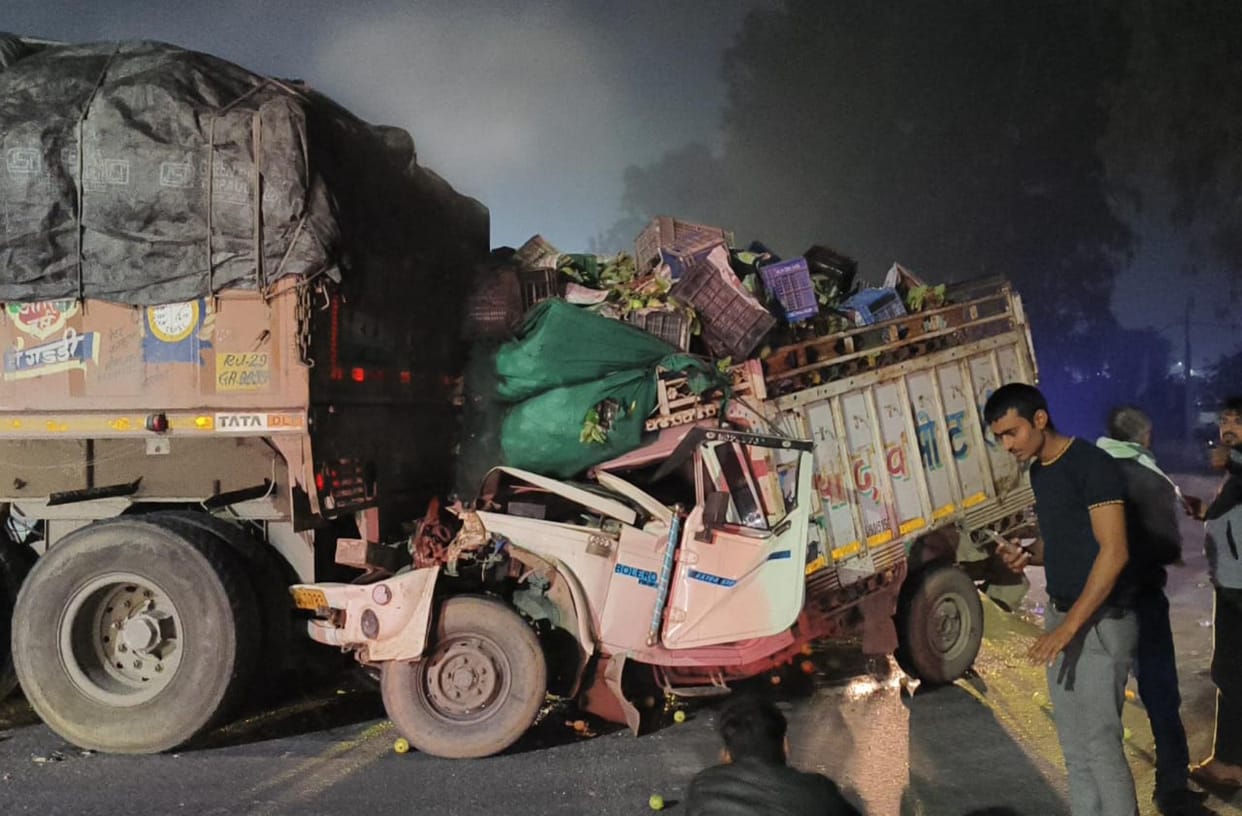 Trailer collides with pickup, driver trapped in vehicle for half an hour