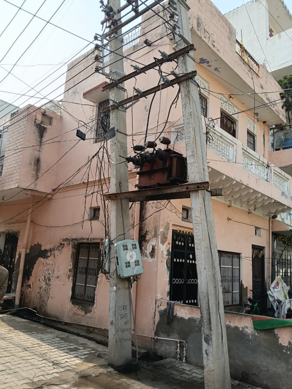 Leaning electricity poles in the Khazanchi neighborhood are inviting accidents.