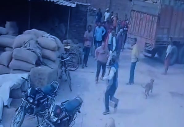 The village head representative was chased and beaten for getting the land measured.