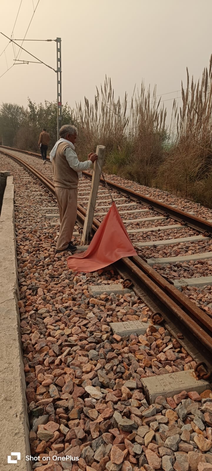 Naultha farmer accuses railway and company officials of colluding to grab land.