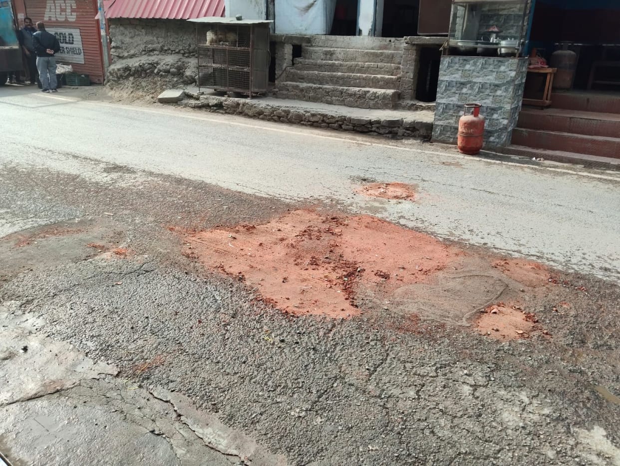 Instead of tar, potholes on the NH were filled with brick waste.