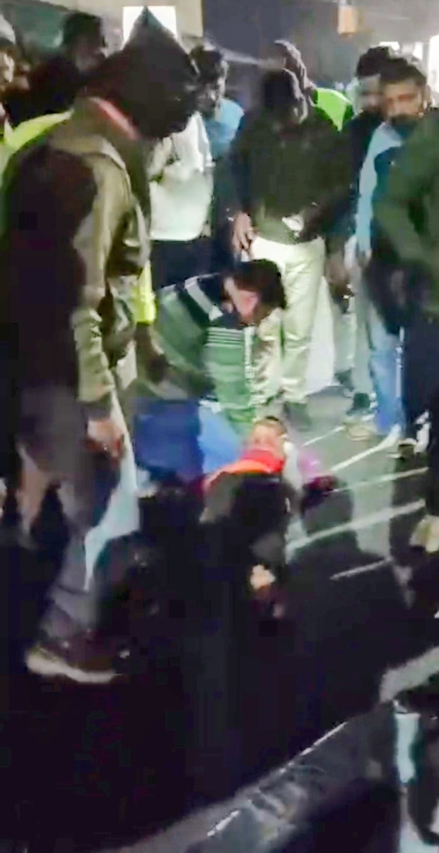 Two youths riding a scooter were injured after being hit by an unknown vehicle