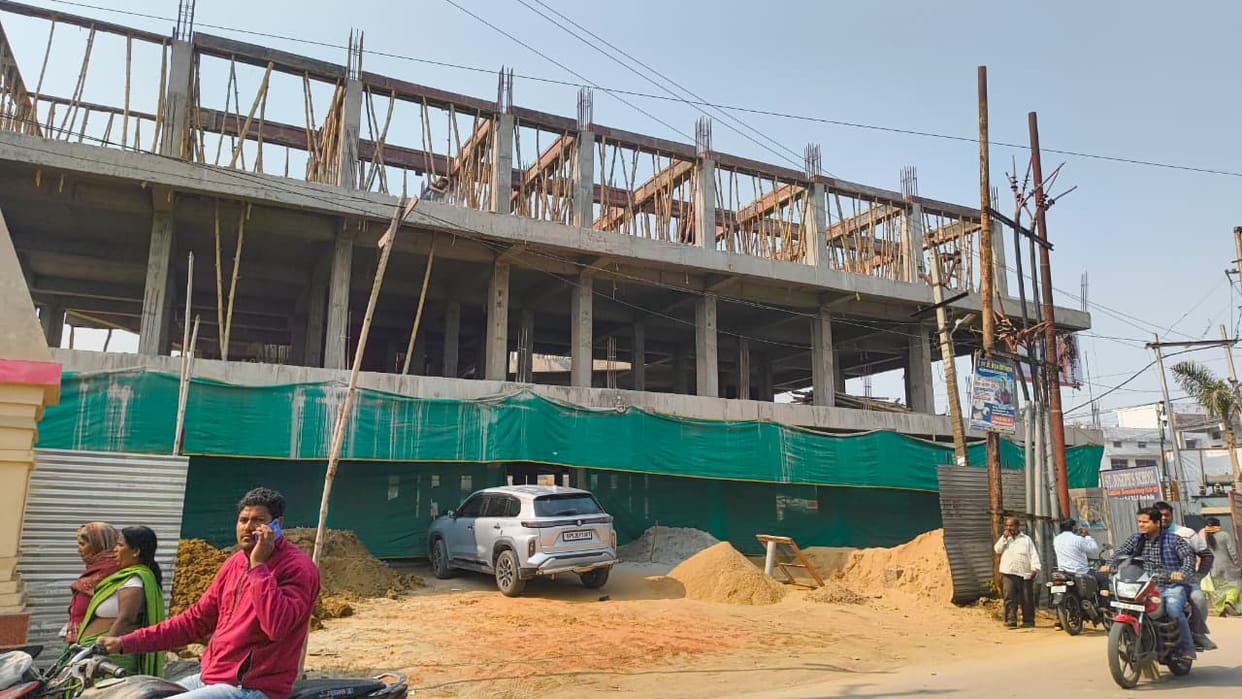 Business will flourish from the shopping complex and vehicles will fill up on the other side.