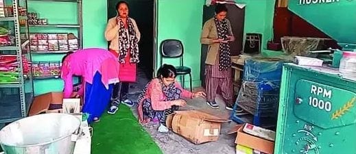 The women of the group are preparing herbal incense and agarbatti.